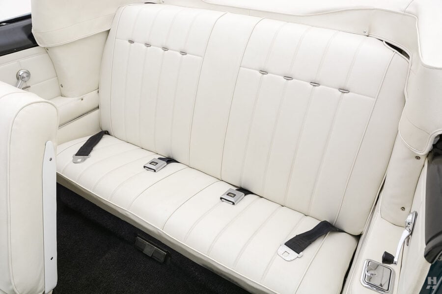 back seats of old chevrolet corvair convertible automobile for sale at hyman dealers