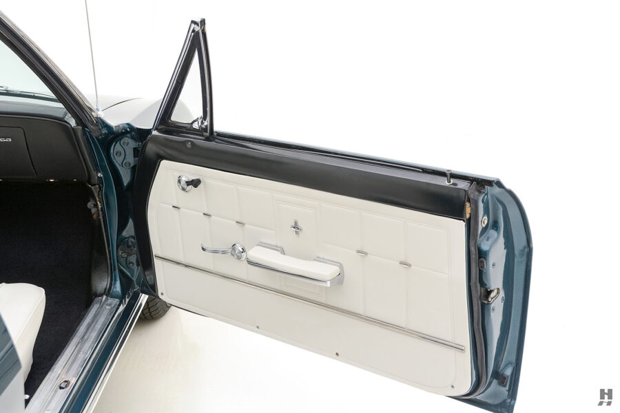 passenger's side door of old chevrolet corvair convertible automobile for sale at hyman dealers