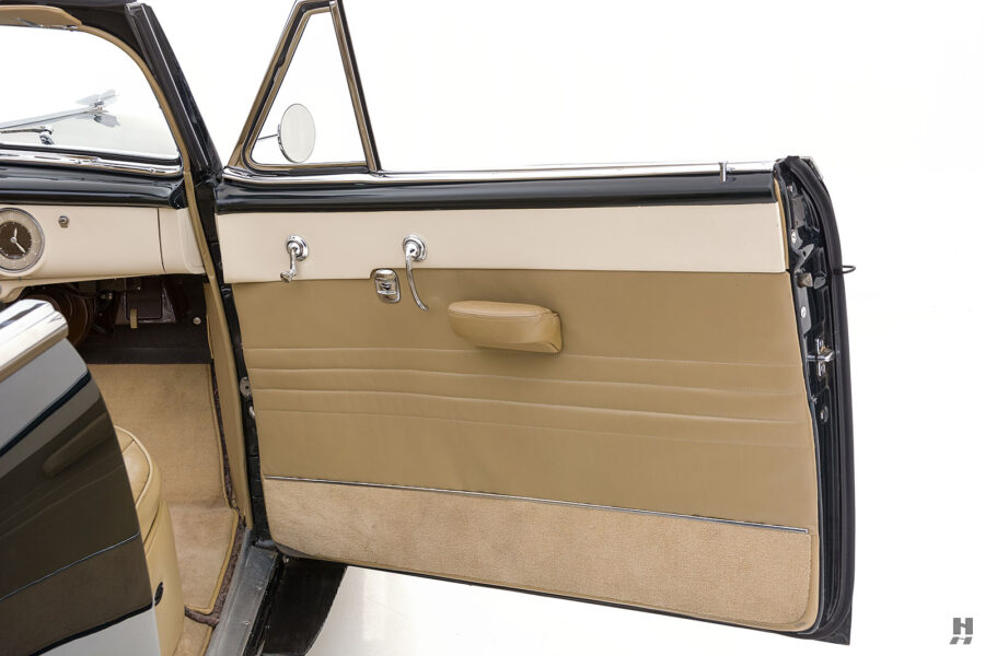 passenger's side door of vintage cadillac convertible for sale at hyman classic cars