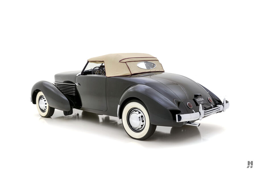 angled backside of restored 1937 cord sportsman convertible for sale at hyman classic cars