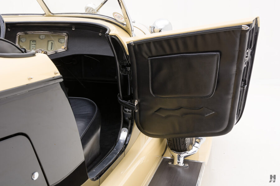 passenger's side door of old auburn speedster for sale at hyman classic cars