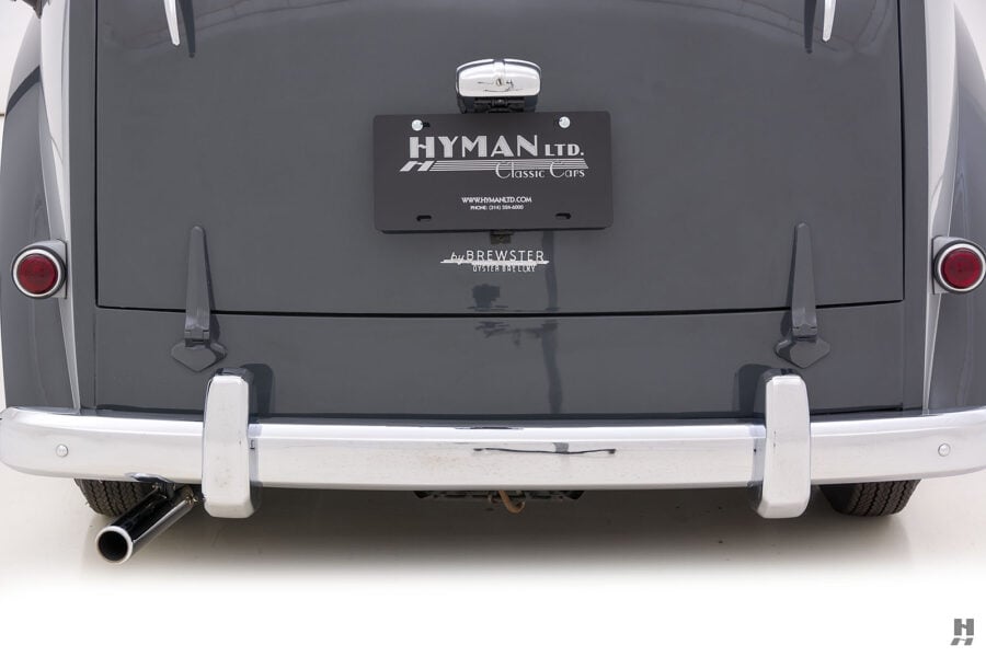 backside of old triumph mayflower for sale at hyman classic car dealers
