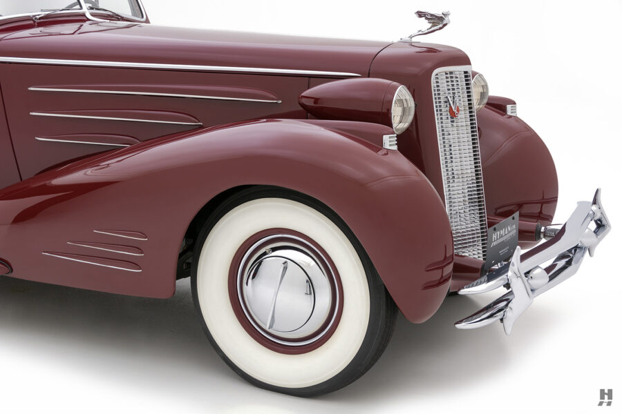 front of old cadillac v-16 convertible for sale by hyman car dealers