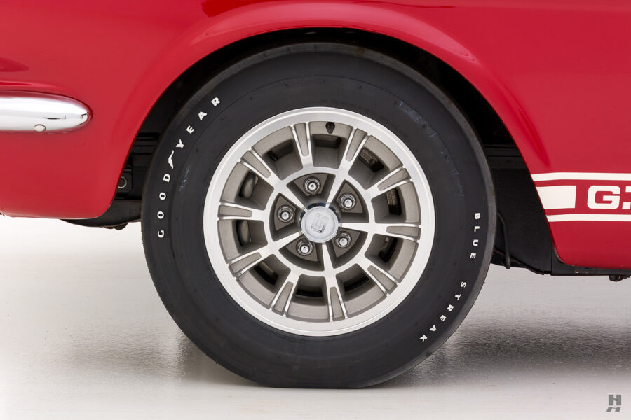 Wheel of old Shelby GT350 for sale by Hyman classic car dealers