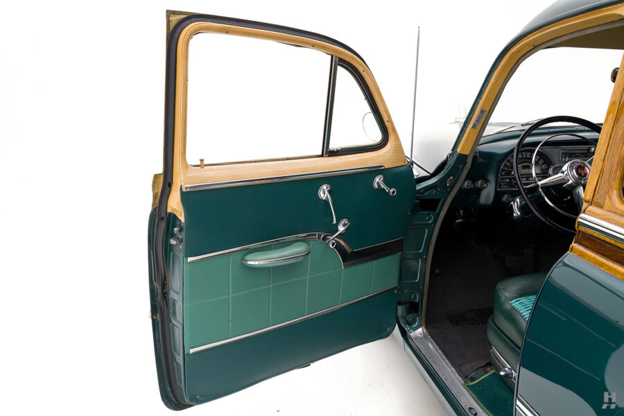 drivers side door of antique pontiac chieftain deluxe station wagon from hyman classic cars