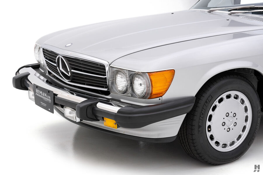 front of vintage 1987 Mercedes-Benz 560SL for sale at Hyman classic car dealers