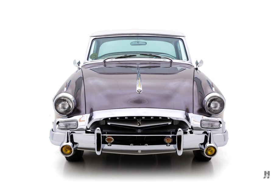 front of old 1955 Studebaker President Speedster for sale by Hyman classic cars
